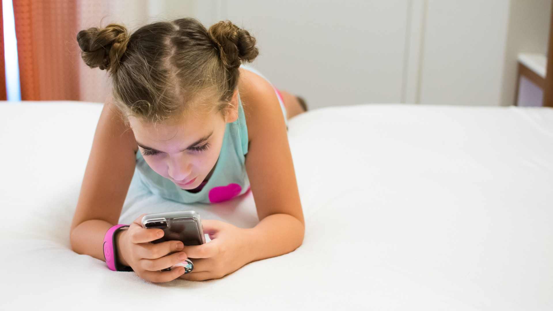 Child cooling off in hotel room at Pop Century